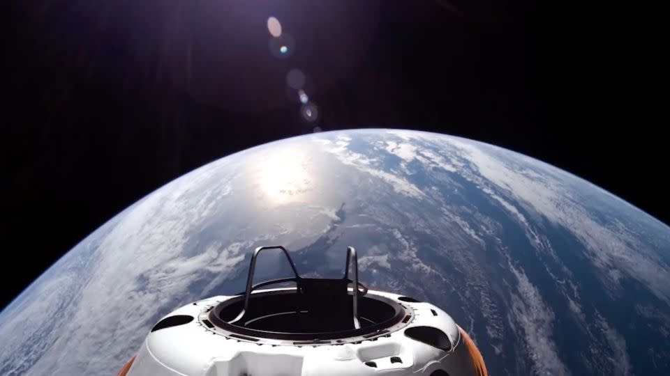 The Crew Dragon capsule of the Polaris Dawn mission is seen Wednesday 875 miles (1,400 kilometers) above Earth — the farthest humans have flown since the Apollo program more than 50 years ago. - SpaceX