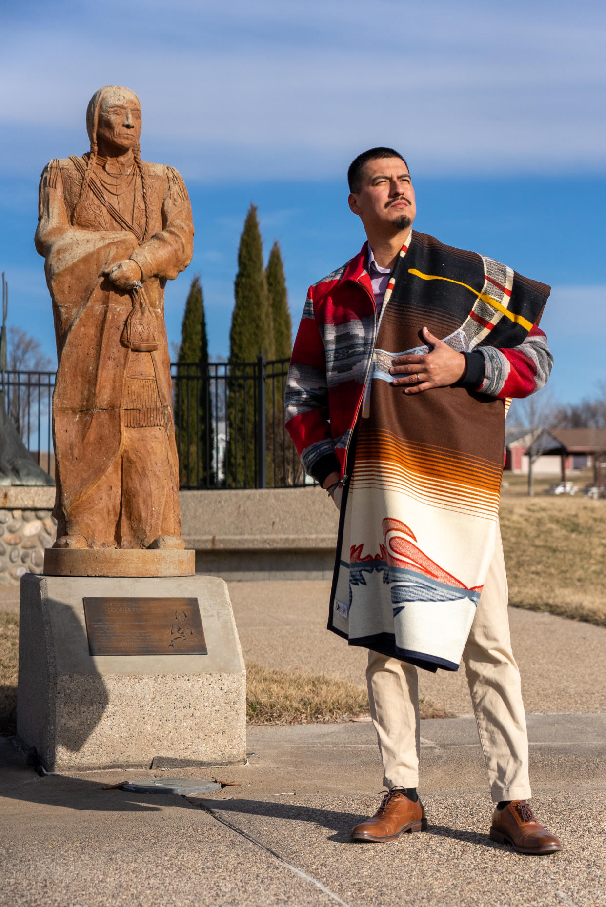 Trey Blackhawk with his award-winning Pendleton Blanket Design.(Photo/American Indian College Fund)