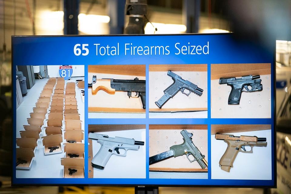 A photo of firearms seized is displayed during a news conference regarding an investigation into the theft of gold from Torontoâ€™s Pearson International airport, in Brampton, Ontario, Canada on Wednesday, April 17, 2024 (AP)