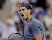 Rafael Nadal of Spain celebrates a point against Novak Djokovic of Serbia in their men's final match at the U.S. Open tennis championships in New York, September 9, 2013. REUTERS/Eduardo Munoz (UNITED STATES - Tags: SPORT TENNIS)