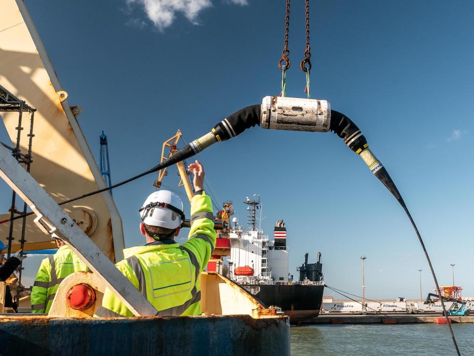 A subsea internet cable is loaded onto a laying vessel.