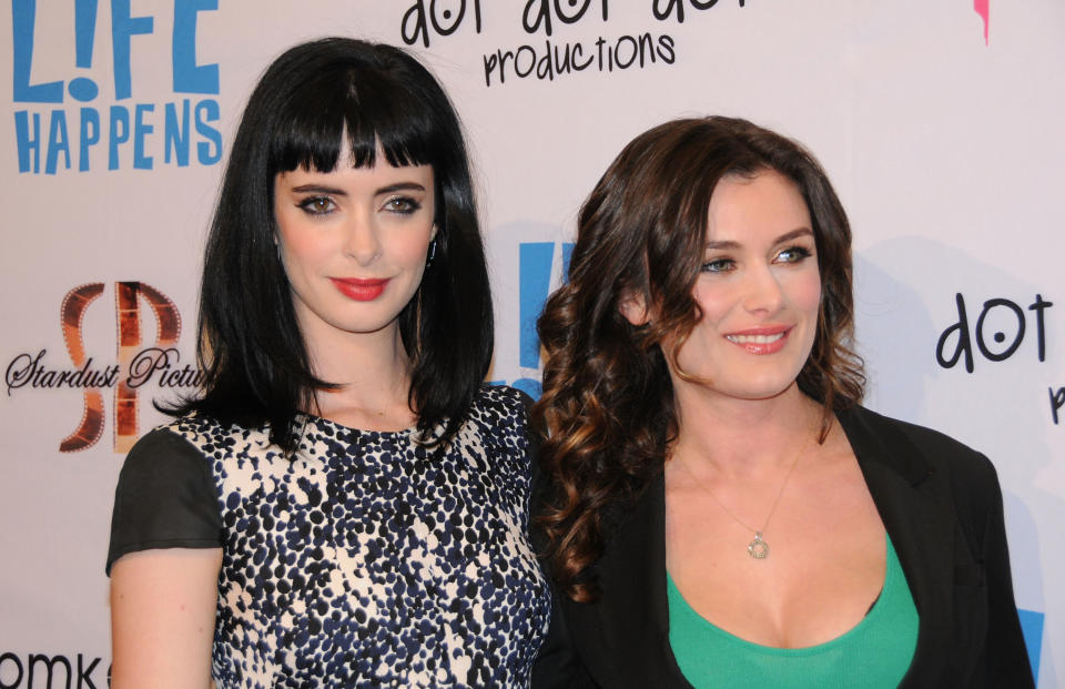 CENTURY CITY, CA - APRIL 02:  Actress Krysten Ritter and director Kat Coiro arrive at the Los Angeles premiere of 'Life Happens' held at AMC Century City 15 theater on April 2, 2012 in Century City, California.  (Photo by Barry King/FilmMagic)