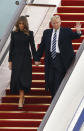 <p>Die US-amerikanische Präsidentengattin überzeugte bereits bei ihrer Ankunft im chinesischen Beijing mit einem schlichten schwarzen Mantel von Christian Dior. Das Outfit rundete sie mit dazu passenden Pumps ab. (Bild-Copyright: Thomas Peter/Pool Photo/AP Photo) </p>