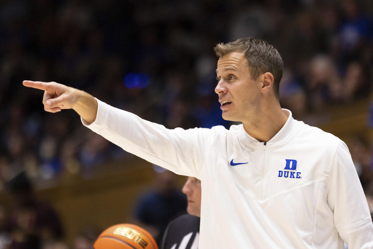 Duke coach Jon Scheyer gestures to the team during the first half of a college basketball exhibition game against Fayetteville State in Durham, N.C., Wednesday, Nov. 2, 2022. (AP Photo/Ben McKeown)