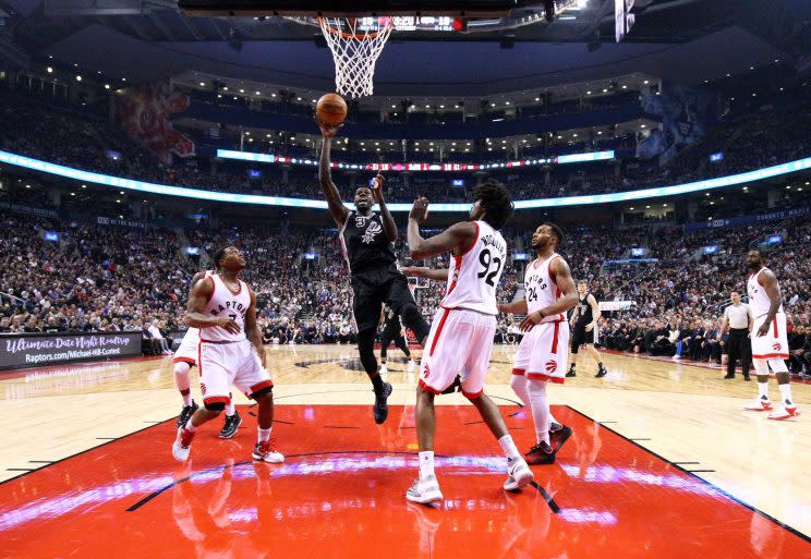 Dewayne Dedmon #3 of the San Antonio Spurs shoots the ball during the first half of an NBA game against the Toronto Raptors at Air Canada Centre on January 24, 2017 in Toronto, Canada. (Photo by Vaughn Ridley/Getty Images)