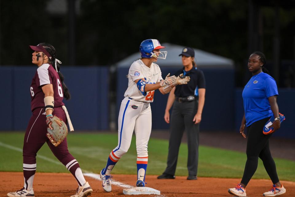 Florida Gators outfielder Katie Kistler (29) cheers after getting to first base against the Texas A&M Aggies May 10, 2024; Auburn, AL, USA; at Jane B. Moore Field. Mandatory Credit: Julie Bennett-USA TODAY Sports