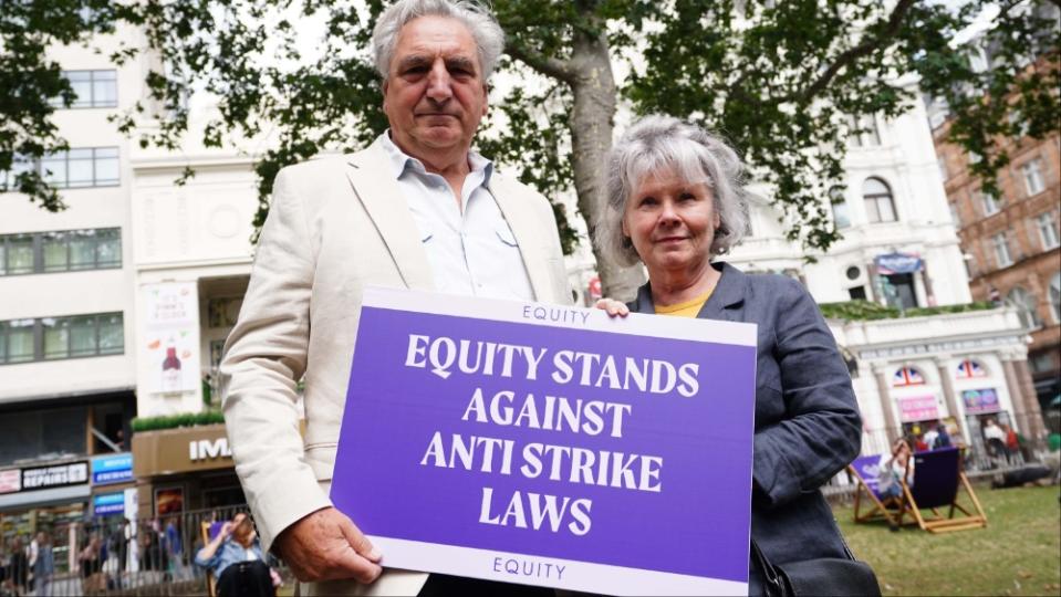 Jim Carter and Imelda Staunton take part in a protest by members of the British actors union Equity in Leicester Square, London, in solidarity with striking Hollywood members of the Screen Actors Guild - American Federation of Television and Radio Artists (Sag-Aftra). 