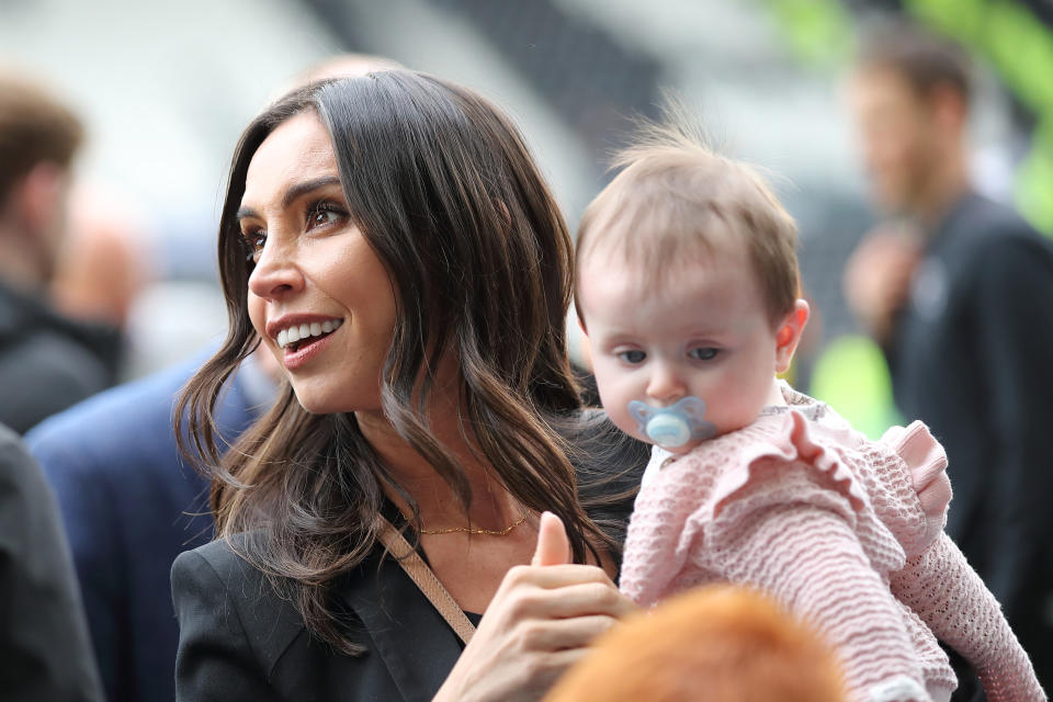 DERBY, ENGLAND - MAY 05:  Wife of Derby County manager \ head coach Frank Lampard, Christine Lampard née Bleakley, with their Patricia Charlotte during the Sky Bet Championship match between Derby County and West Bromwich Albion at Pride Park Stadium on May 5, 2019 in Derby, England. (Photo by Matthew Ashton - AMA/Getty Images)