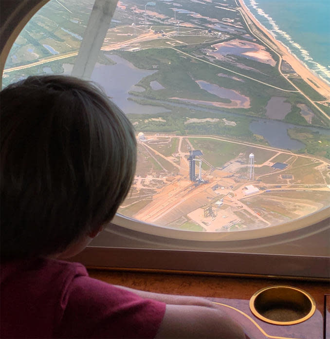 Jack Hurley, son of Crew Dragon commander Doug Hurley and retired astronaut Karen Nyberg, gets a bird's eye view of launch pad 39A and his dad's SpaceX rocket near the end of a flight from Houston to watch the launching Wednesday. Tweeted Nyberg: 