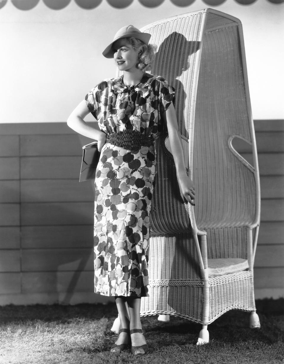 Ball poses in a printed dress in Hollywood, 1936.&nbsp;