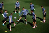 Soccer Football - Real Madrid training - UEFA Champions League Quarterfinal - Valdebebas training grounds, Madrid, Spain - 17/04/17 - Real Madrid's Cristiano Ronaldo kicks the ball during training. REUTERS/Susana Vera