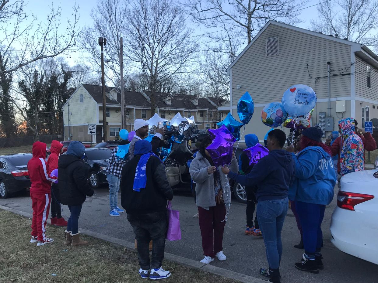 Friends and family of Donnell Steele, a man killed in a shooting in Millvale last year, gathered near the scene of his murder for the one-year anniversary of his death on Feb. 18, 2022.