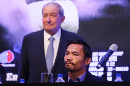 Promoter Bob Arum (L) said Manny Pacquiao (R) look on during a press conference. (Getty)