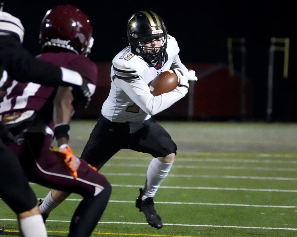 Skipper Trent Sterner heading for the North Kingstown goal.