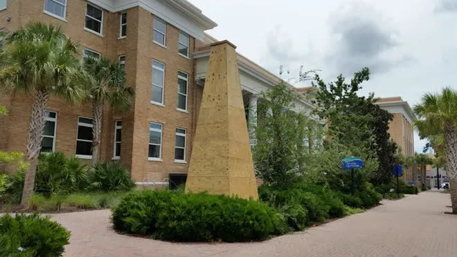The Manatee County Confederate monument was covered in wood for protection before it was moved away from the courthouse in 2017.