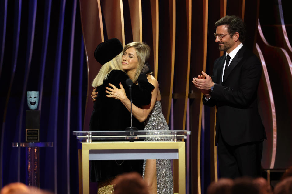 LOS ANGELES, CALIFORNIA - FEBRUARY 24: (L-R) Barbra Streisand accepts the SAG Lifetime Achievement Award from Jennifer Aniston and Bradley Cooper onstage during the 30th Annual Screen Actors Guild Awards at Shrine Auditorium and Expo Hall on February 24, 2024 in Los Angeles, California. (Photo by Matt Winkelmeyer/Getty Images)