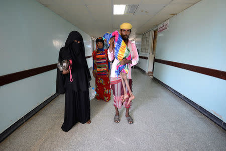 Saida Ahmad Baghili, 18, is carried by her cousin at the al-Thawra hospital where she receives treatment for severe acute malnutrition in the Red Sea port city of Houdieda, Yemen October 25, 2016. REUTERS/Abduljabbar Zeyad