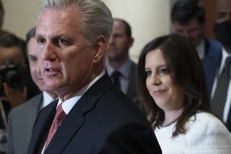 House Minority Leader Kevin McCarthy of Calif., speaks with reporters, joined by newly-elected House Republican Conference Chair Rep. Elise Stefanik, R-N.Y., on Capitol Hill Friday, May 14, 2021, in Washington. (AP Photo/Alex Brandon)