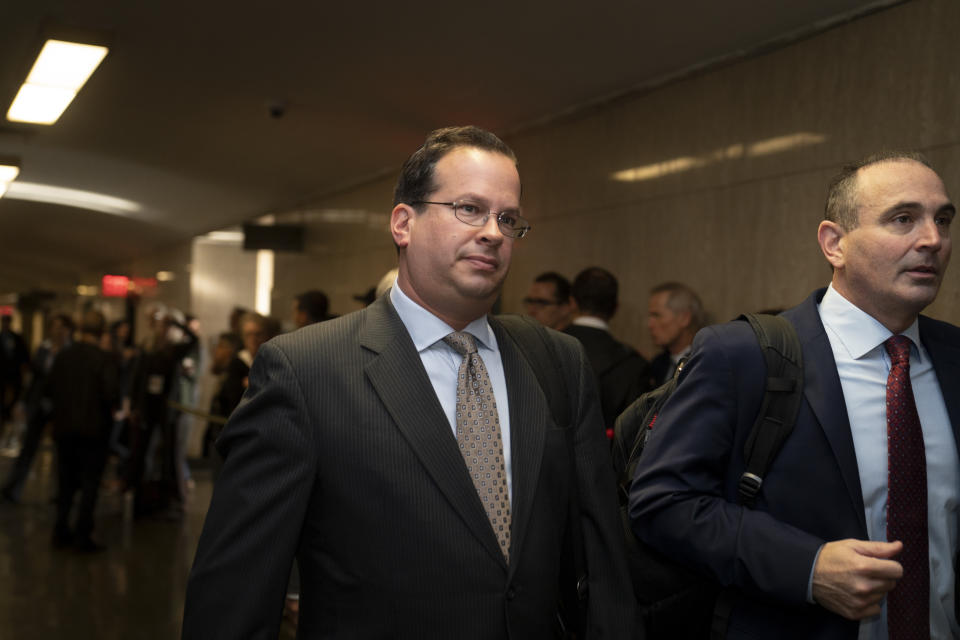 Assistant Manhattan District Attorney Joshua Steinglass, center left, arrives to criminal court, Monday, Oct. 31, 2022, in New York. The Trump Organization is on trial this week for criminal tax fraud. (AP Photo/John Minchillo)