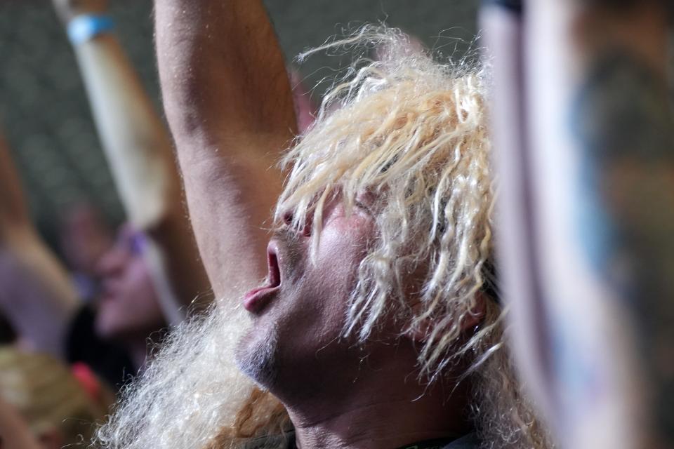 Fans cheer on Poison as they perform at State Farm Stadium during The Stadium Tour featuring Def Leppard, Mötley Crüe, and Joan Jett and the Blackhearts on Thursday, Aug. 25, 2022.  