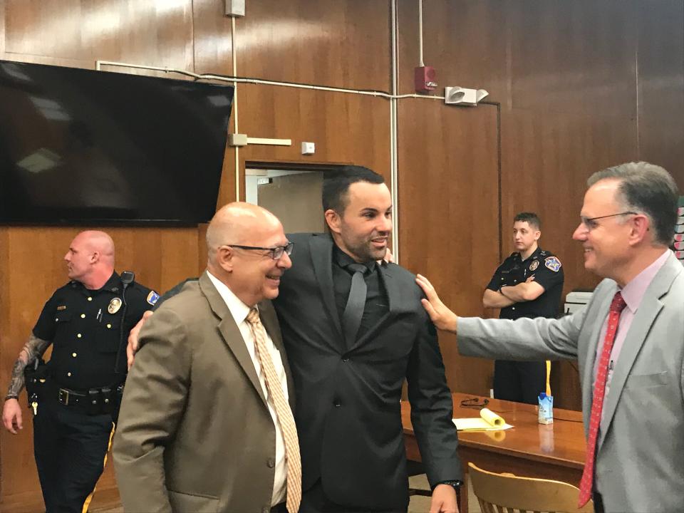 Marc Messing and his attorneys John Bruno and Kenneth Ralph after the verdict in June 2019.