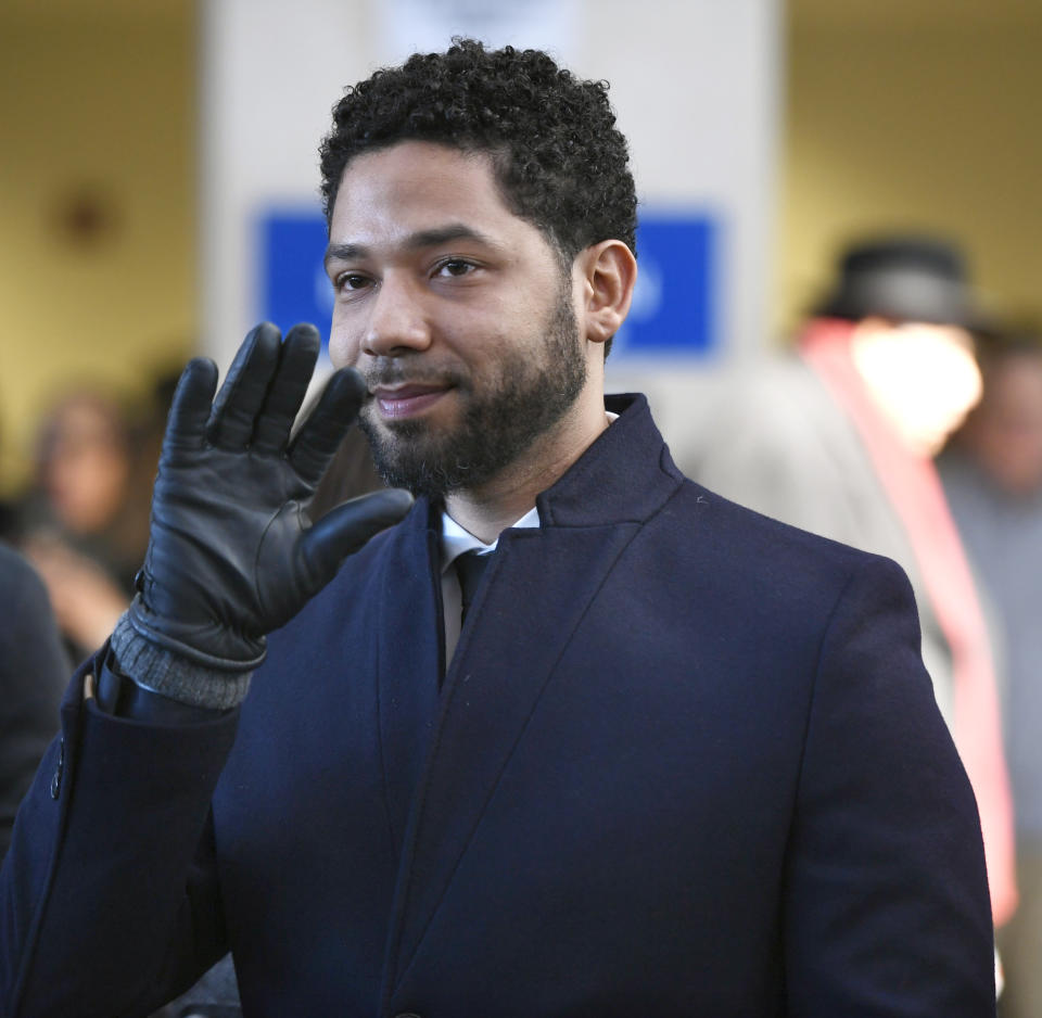 FILE - In this March 26, 2019 file photo, actor Jussie Smollett smiles and waves to supporters before leaving Cook County Court after his charges were dropped, in Chicago. A Chicago judge is expected to decide whether to let a former U.S. attorney stay on as special prosecutor examining the dismissal of charges against actor Smollett. The hearing Friday, Oct. 4, 2019, comes after Dan Webb revealed he co-hosted a fundraiser for Kim Foxx during her 2016 run for Chicago’s top prosecutor job. Her office in March abruptly dropped charges accusing Smollett of staging a racist, homophobic attack on himself. (AP Photo/Paul Beaty)