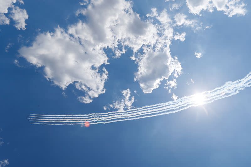 Japan Air Self-Defense Force stages a flyover to salute the medical workers at the frontline of the fight against the coronavirus disease (COVID-19), in Tokyo