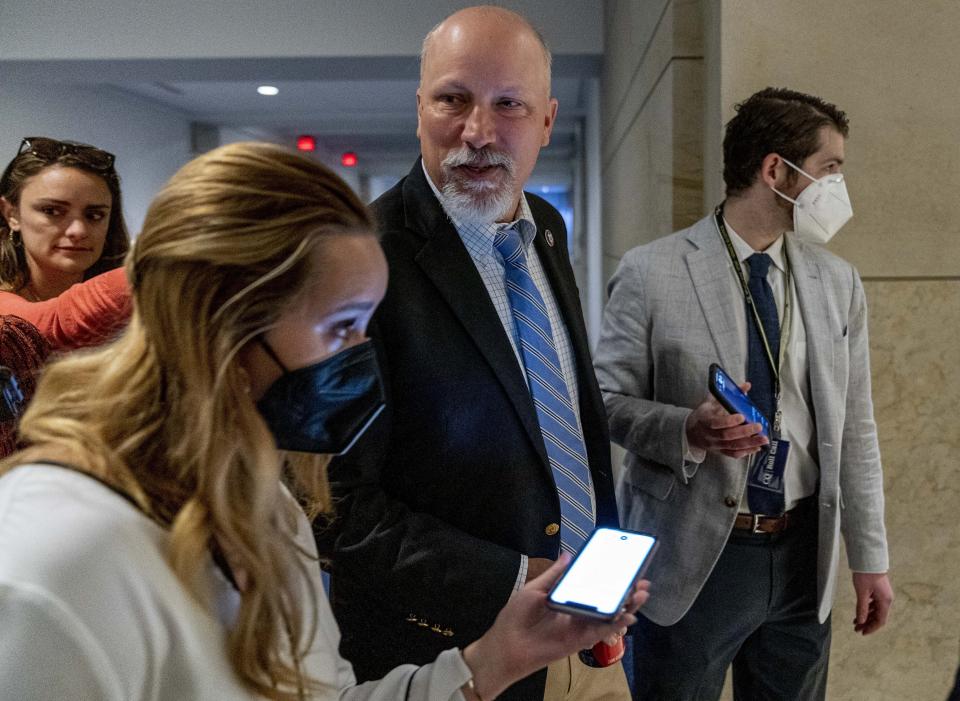 Rep. Chip Roy, R-Texas, center, arrives as the House Republican Conference meets to elect a new chairman to replace Rep. Liz Cheney, R-Wyo., who was ousted from the GOP leadership for her criticism of former President Donald Trump, at the Capitol in Washington, Friday, May 14, 2021. (AP Photo/Andrew Harnik)