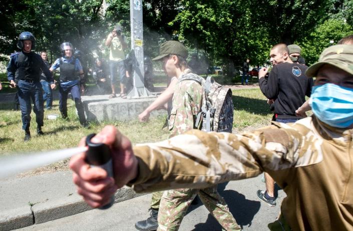 At the gay pride march in Kiev on June 6, 2015, scufles broke out after activists were attacked by far-right nationalists with tear gas (AFP Photo/Volodymyr Shuvayev)