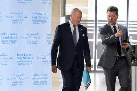 UN Special Envoy for Syria Staffan de Mistura (L) arrives for a meeting during Syria peace talks in Geneva, Switzerland, February 27, 2017. REUTERS/ Fabrice Coffrini/Pool