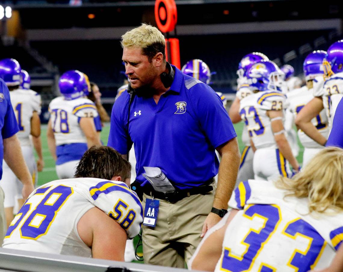 Brock head coach Billy Mathis talks to the team on the bench during a high school 3A division 1 state championship football game at AT&T Stadium in Arlington, Texas, Thursday, Dec. 16, 2021. Lorena defeated Brock 35-18. (Special to the Star-Telegram Bob Booth)