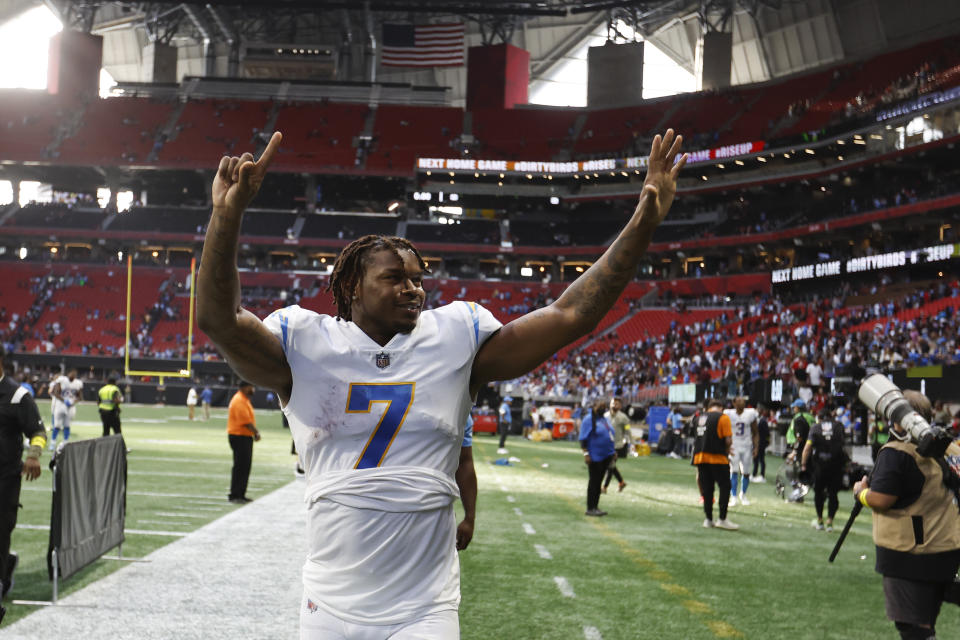 Los Angeles Chargers tight end Gerald Everett (7) celebrates as he walks off the field after an NFL football game against the Atlanta Falcons, Sunday, Nov. 6, 2022, in Atlanta. The Chargers won 20-17. (AP Photo/Butch Dill)