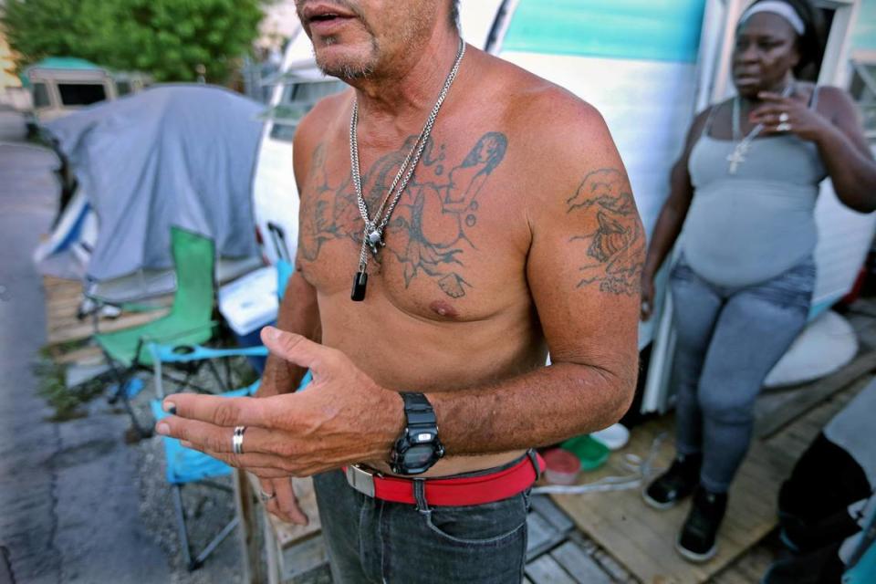 Convicted child sex offenders Roberto Garcia, 53, and Vancel Johnson, 53, live in a trailer in a tent city at 3600 NW 48th St. Garcia says he used to be a musical artist.