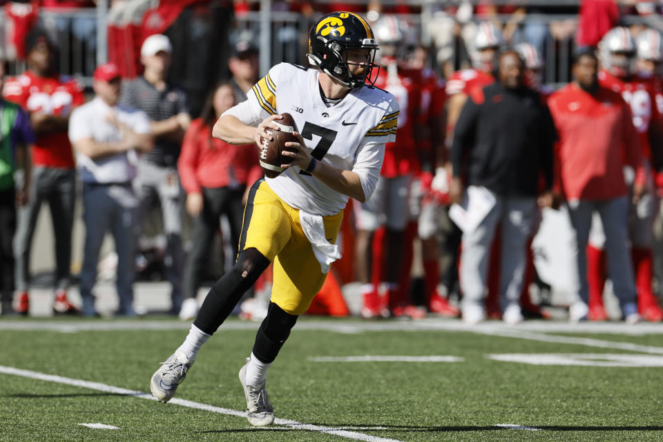 Iowa quarterback Spencer Petras drops back to pass against Ohio State during the first half of an NCAA college football game Saturday, Oct. 22, 2022, in Columbus, Ohio. (AP Photo/Jay LaPrete)