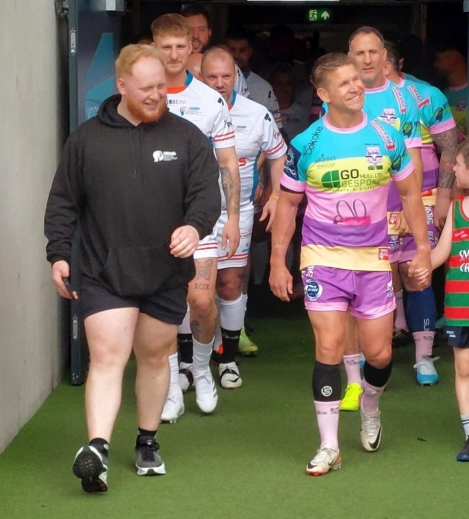 York Press: Cain North (left) and Wayne Godwin (right) lead out the teams