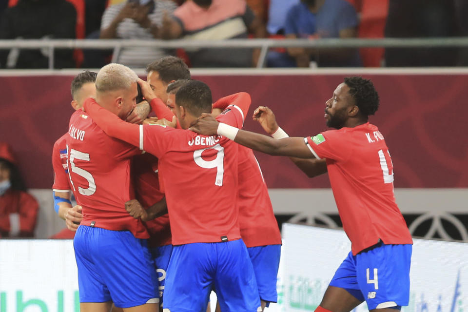 Costa Rica's players celebrate after a goal during the World Cup 2022 qualifying play-off soccer match between New Zealand and Costa Rica in Al Rayyan, Qatar, Tuesday, June 14, 2022. (AP Photo/Hussein Sayed)