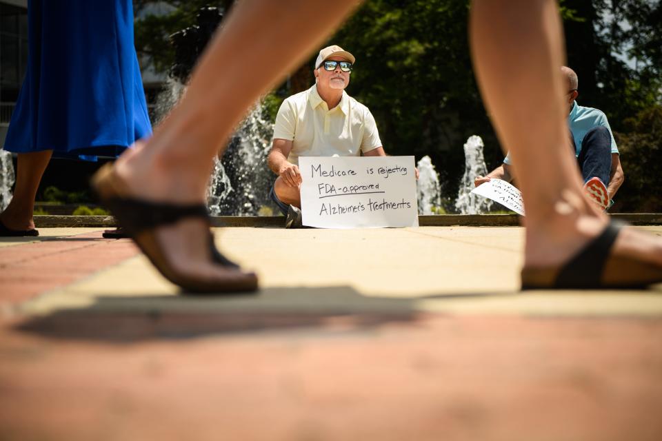 Voices of Alzheimer's holds a die in at Cross Creek Linear Park on Tuesday, June 13, 2023. The group wants Medicaid to approve coverage of a new fast-tracked Alzheimer's drug.