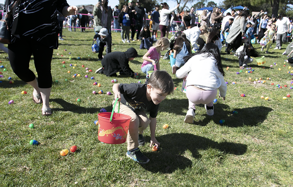 Kids in the under-6 group run to collect plastic eggs filled with treats at the 34th annual Egg Hunt and Festival at Elm Street Park in Arroyo Grande on Saturday, April 8, 2023. The event featured hundreds of eggs, toys and candy for the kids, along with a hunt for adults as well. Laura Dickinson/The Tribune