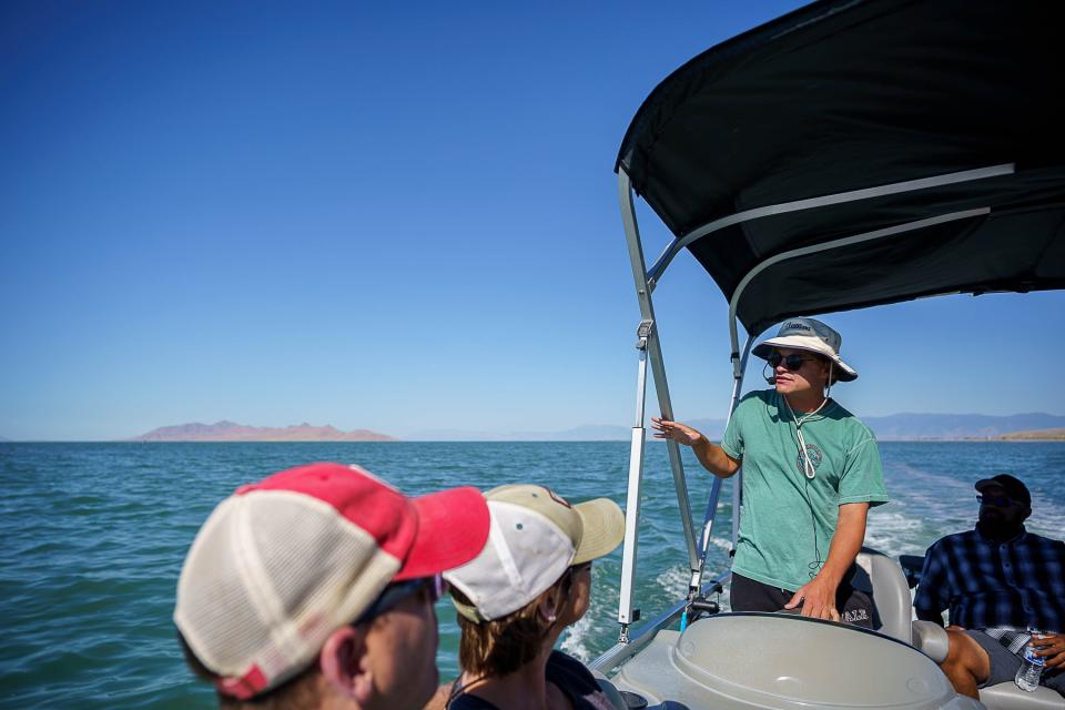 Nathan Thacker pilots a sightseeing boat tour of the Great Salt Lake for Exclusive Excursions on Saturday, Sept. 16, 2023. | Trent Nelson, The Salt Lake Tribune