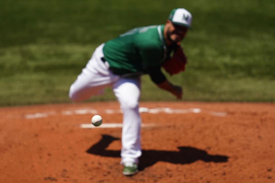 Mexico's Manuel Barrera pitches during a baseball game against Israel at Yokohama Baseball Stadium during the 2020 Summer Olympics, Sunday, Aug. 1, 2021, in Yokohama, Japan. (AP Photo/Matt Slocum)