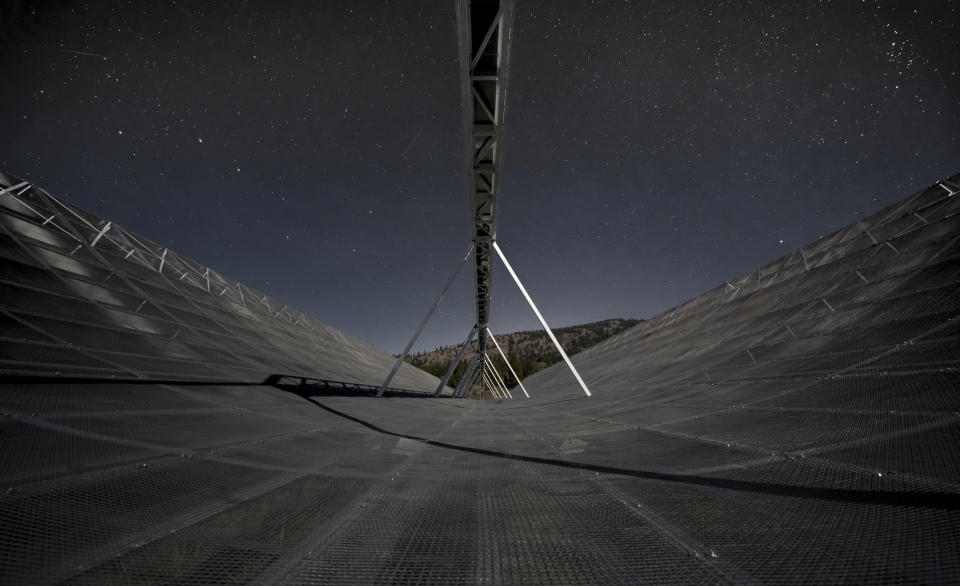 CORRECTS TO NOV. 4 NOT NOV. 5 - This November 2016 photo provided by the Canadian Hydrogen Intensity Mapping Experiment collaboration shows the CHIME radio telescope at the Dominion Radio Astrophysical Observatory in Kaleden, British Columbia, Canada. On Wednesday, Nov. 4, 2020, astronomers say they used the instrument to trace an April 2020 fast cosmic radio burst to our own galaxy and a type of powerful energetic young star called a magnetar. The burst was also detected by a California doctoral student’s set of handmade antennas. (Andre Renard/University of Toronto via AP)