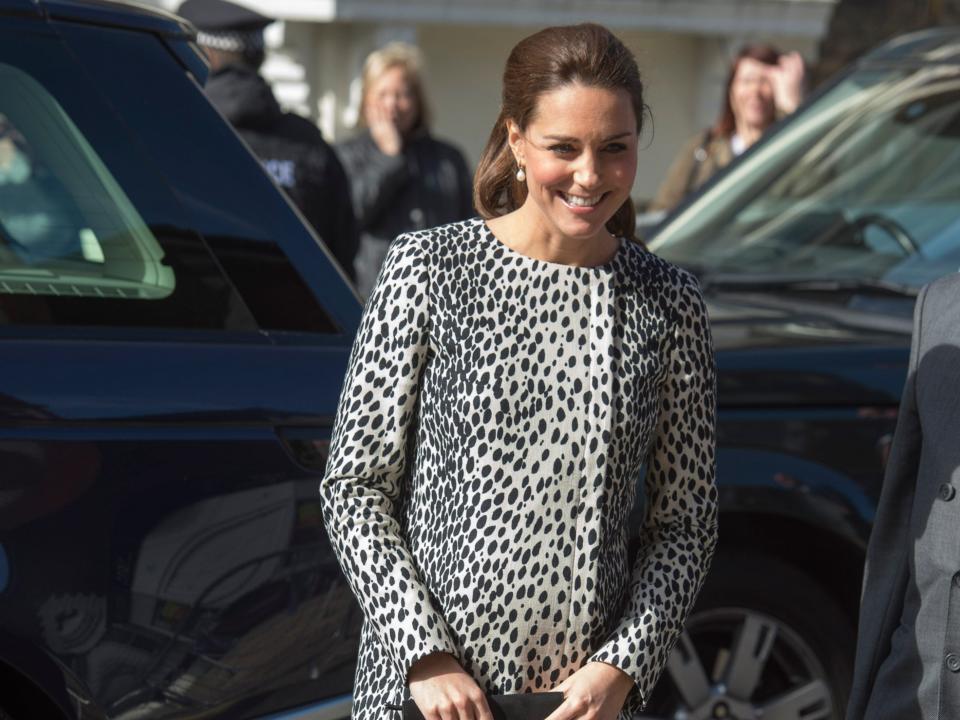 Kate Middleton wearing an animal print maternity dress