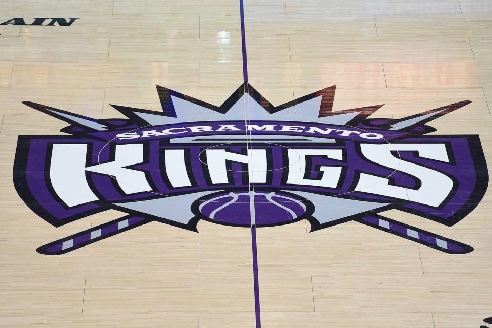 <p> Thearon W. Henderson/Getty</p> The Sacramento Kings logo at center court 