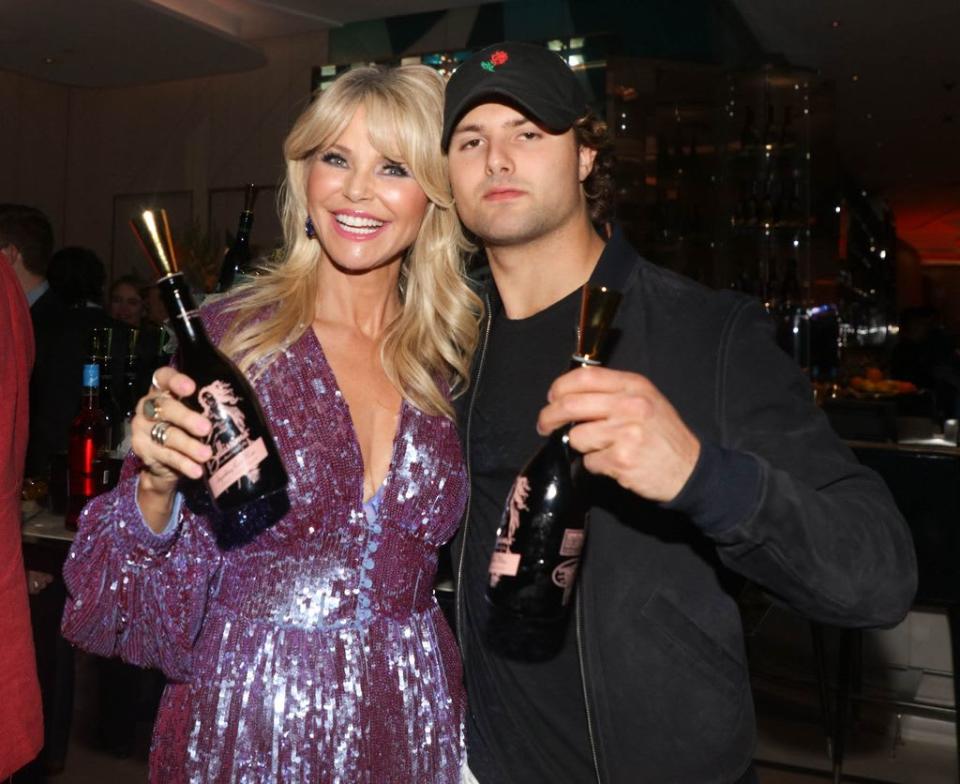 Christie brinkley poses with her son Jack