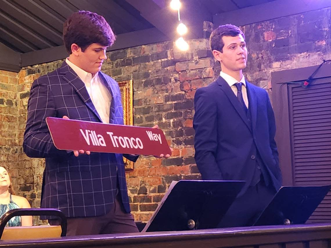 Brothers, from left, Donovan, and Tripp Roche speak Sept. 12, 2024 at Villa Tronco restaurant during a ceremony unveiling a street sign for Villa Tronco Way. Columbia City Council has honorarily named the 1200 block of Blanding Street for the restaurant.