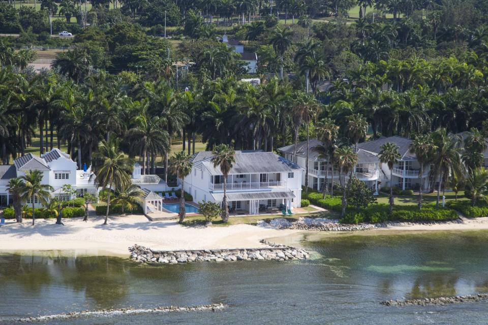 montego bay view of half moon resort featuring the sea sand and palm trees