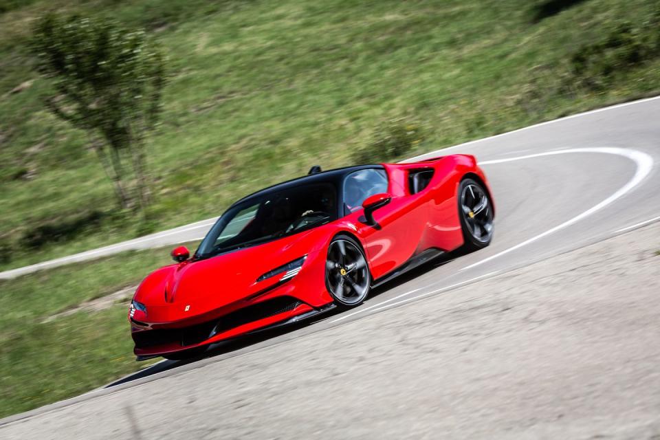 <p>Even with the extra grunt from the three hybrid motors, the SF90 Stradale isn't able to eclipse the F8 Tributo's or the 812 Superfast's 211-mph terminal velocity. Make no mistake, it's still ridiculously quick. But <a href="https://www.roadandtrack.com/new-cars/first-drives/a32972782/the-ferrari-sf90-stradale-is-ridiculously-easy-to-drive/" rel="nofollow noopener" target="_blank" data-ylk="slk:with nearly 1000 horsepower on tap;elm:context_link;itc:0;sec:content-canvas" class="link ">with nearly 1000 horsepower on tap</a>, we might've been expecting more. </p>