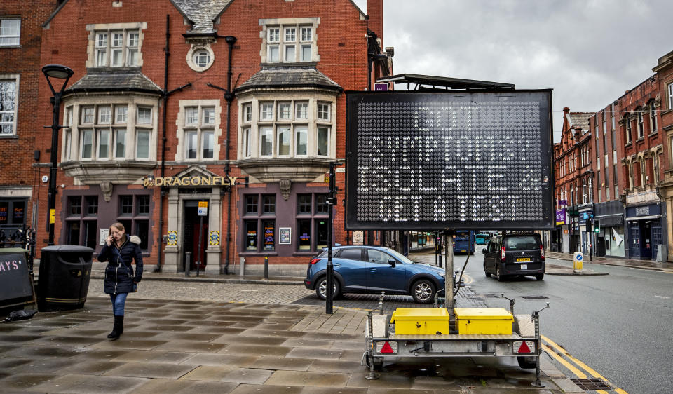 An electronic notice board in Bolton town centre, one of the areas of the UK where the Covid variant first identified in India is spreading fastest. Picture date: Tuesday May 25, 2021.