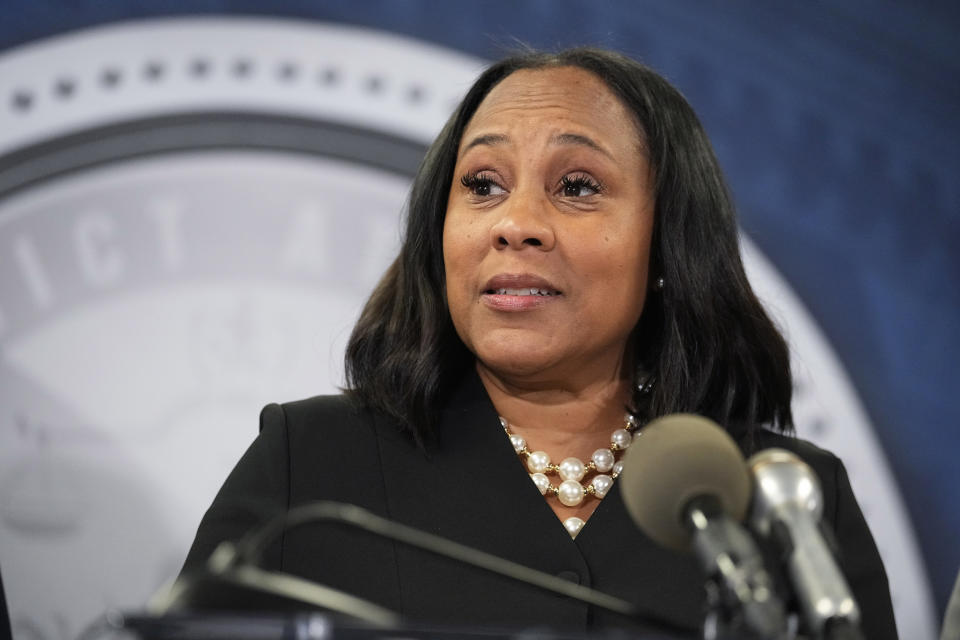 FILE - Fulton County District Attorney Fani Willis speaks in the Fulton County Government Center during a news conference, Aug. 14, 2023, in Atlanta following the indictment of former President Donald Trump and 18 others over efforts to overturn Trump’s 2020 election loss in Georgia. A number of Republicans have been looking for ways to remove or punish Willis for the indictment. (AP Photo/John Bazemore, File)