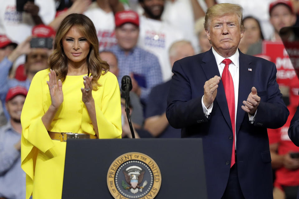 First lady Melania Trump and President Donald Trump greet supporters at a rally to formally announce his 2020 re-election bid Tuesday, June 18, 2019, in Orlando, Fla. (AP Photo/John Raoux)
